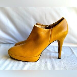 Vince Camuto Leather Elvin ankle bootie in cognac